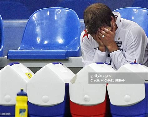 English Midfielder David Beckham Reacts After Being Injured During