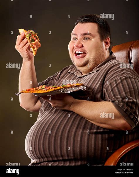 Fat Man Eating Fast Food Pizza Breakfast For Overweight Person Stock