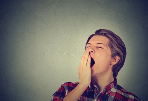 Closeup Portrait Of A Tired Yawning Man Of European Appearance Stock 9e6