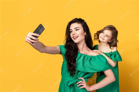 premium photo awesome mother with daughter taking selfie