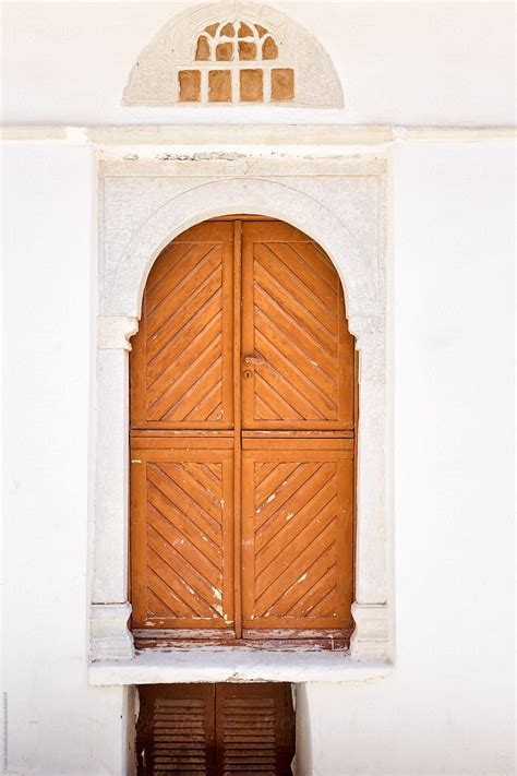 Arched Wooden Door By Stocksy Contributor Helen Sotiriadis Stocksy