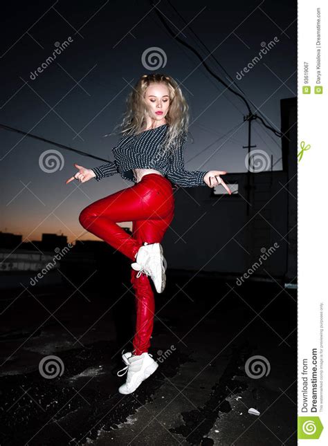 Outdoor Portrait Of Young Beautiful Happy Blond European Lady Posing On