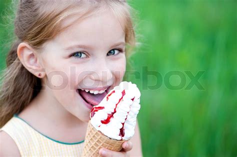 Beautiful Little Girl Eats Ice Cream Stock Image Colourbox