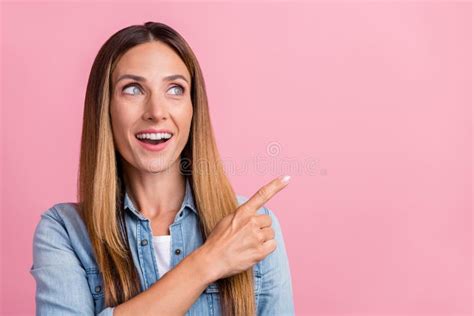 Photo Of Young Cheerful Lady Look Indicate Finger Empty Space Banner