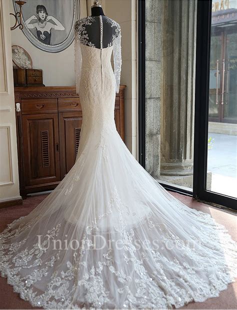 memraid illusion neckline long sleeve lace beaded wedding dress with buttons