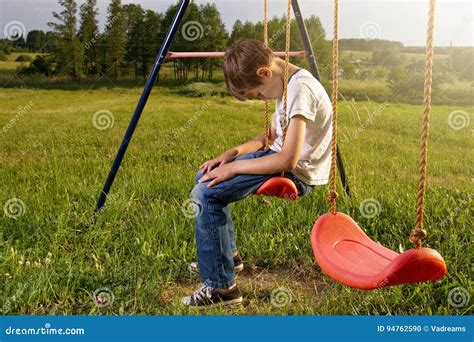 Sad Lonely Boy Sitting On Swing Stock Photo Image Of Mood Caucasian