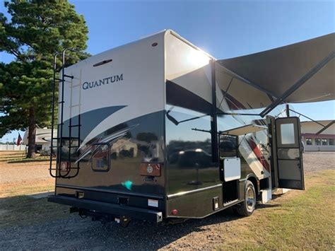Queen bed slide out in rear and overhead bed above cab with weight limit of 250lbs. 2021 Thor Motor Coach Quantum KW29 | Campers RV Center