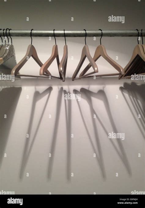 Empty Coat Hangers In Wardrobe Stock Photo Alamy