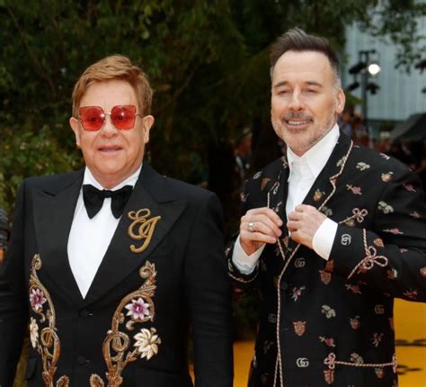 A look at sir elton john and his husband david furnish's incredible love story. Elton John with husband David Furnish | Celebrities ...