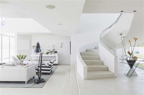 White Modern Luxury Home Showcase Spiral Staircase And Living Room