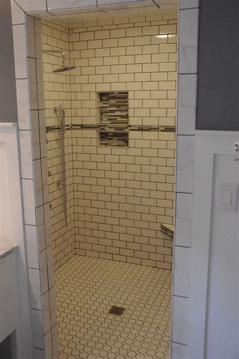 Find inspiration to create your own personal oasis with these projects featuring popular counter. White subway tile shower with glass inserts after bathroom ...