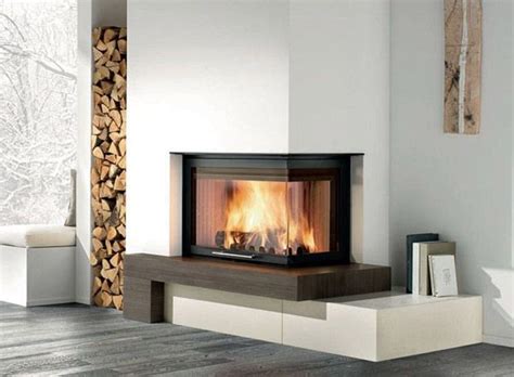 The corner placement is a unique design element, making use of a space that generally isn't the focal point of a room. modern corner fireplaces - Google Search | mgarr ...