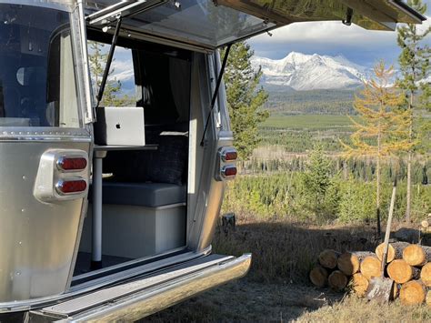 An Open Door To Adventure Highlighting The Rear Hatch Airstream