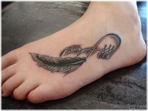 Feather Tattoo On Foot Tattoo Designs Tattoo Pictures