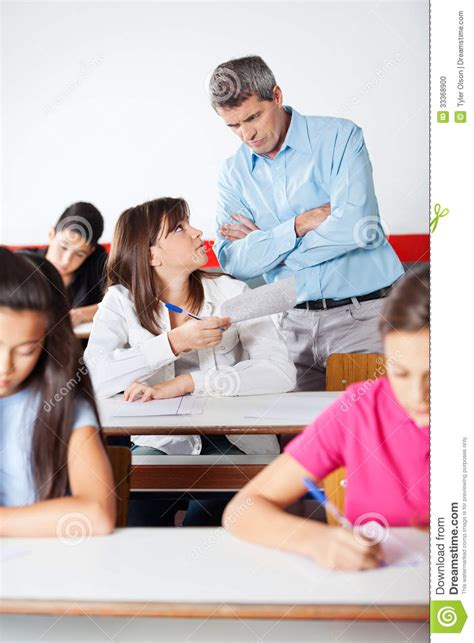 Maybe you would like to learn more about one of these? Angry Teacher Looking At Student Stock Photo - Image: 33368900