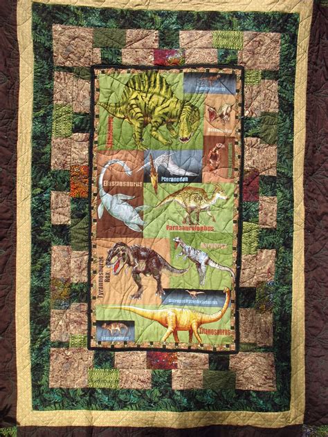Free panel quilt patterns to inspire you with different ways on using a panel in your next quilt. piece-fulness: Grandson's Dinosaur Quilt