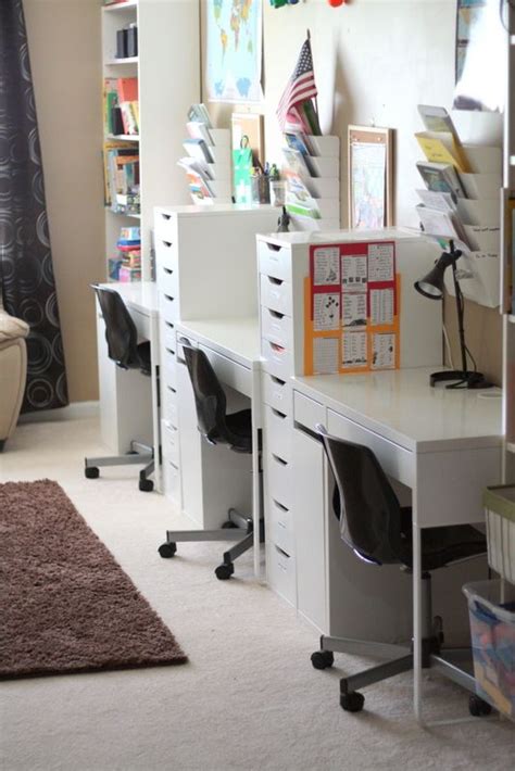 The cabinets were custom built for the space. divided desks with drawers | Homeschool room organization ...