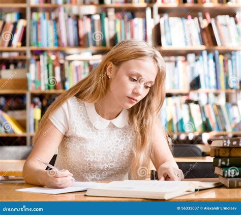 Young Female Student Doing Assignments In Library Stock Image Image