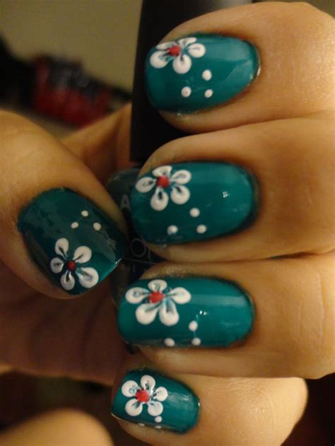 You must handle the nails and to give them the desired shape. Simple flower nail art... Paint nails any shade you like ...