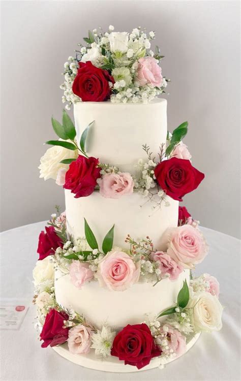 4 Tier Wedding Cake With Red And Pink Roses The Cakery Leamington The