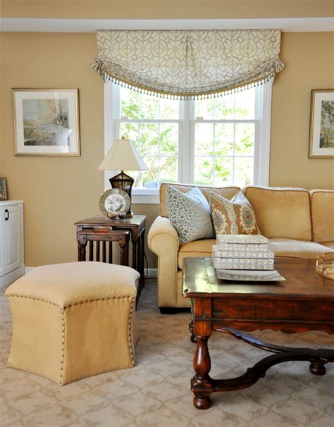 Owned and operated by diane copelan. White, marigold, green and tan living room with draperies ...