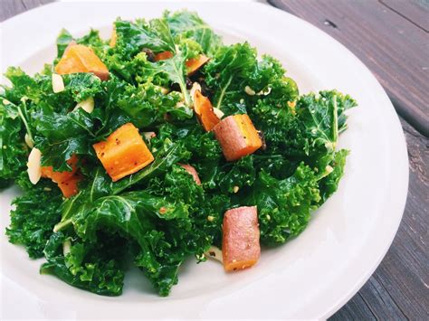 Prepared with earthy spices like cumin and cinnamon, this dish develops deeply satisfying flavors that are sure to fill any fall craving. Kale & Roasted Sweet Potato Salad (with Raisins & Almonds) | Salad with sweet potato, Roasted ...