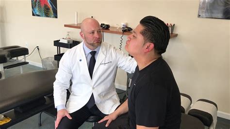 Chiropractic Adjustment With Spanish Speaking Patient At Fanwood Back