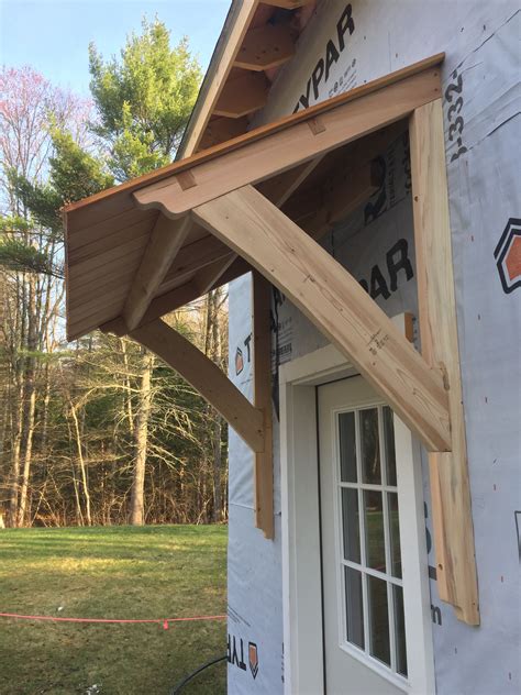 This awning is super easy to build. #Awning #Barn #MortiseandTenon #Cedar | Porch roof, Front door, House design