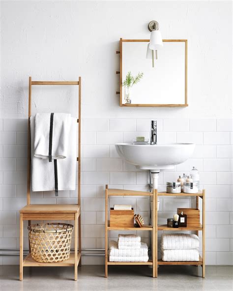 This ladder shelf is often found in living rooms, and looks elegant holding books and magazines — but in the bathroom it offers slender storage for clean towels and toilet paper. Small Bathroom Storage Ideas and Latest Style Buys