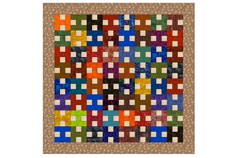 This pretty quilt is so simple to make. Scrappy Patchwork Quilt Pattern with Easy 'H' Blocks