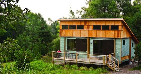 Guests can enjoy camping in tents, rvs or cabins; Northern Michigan Cabins: New Green Prefab in Traverse ...