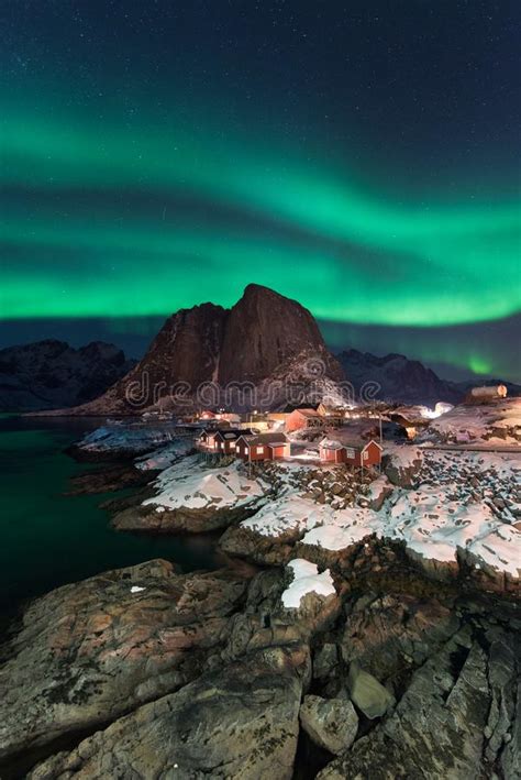 Northern Lights Over The Hamnoy Village At Night In Winter