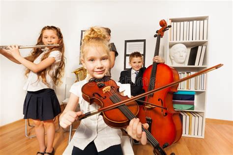 Performance Of Kids Who Play Musical Instruments Stock Photo Image