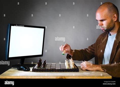 Human Chess Player Against Computer Stock Photo Alamy