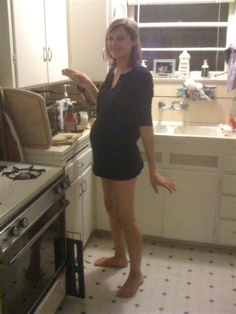 barefoot and pregnant in the kitchen captions trend today