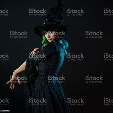 A Witch Creates Magic A Young Beautiful Brunette In A Pointed Hat Stock