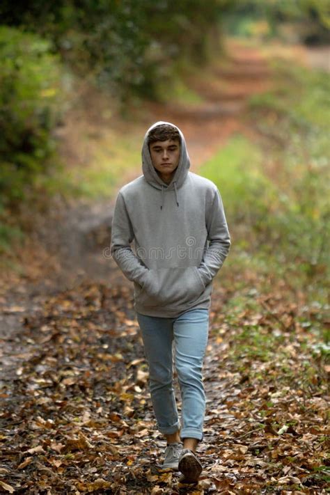 Teenage Boy Walking Alone On An Atumn Day Stock Photo Image Of Hood
