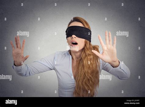 Young Businesswoman Walking Blindfolded With Hands Forward Isolated On