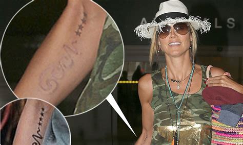 Heidi Klum Shows Off The Results Of Tattoo Removal As Seals Name Is Now Barely Visible On Her