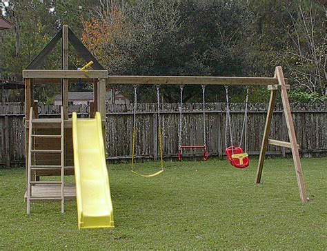 A few meters of rope, a few timber beams and your son could became the spiderman. Do It Yourself Wooden Swing Set Plans | How To build a ...