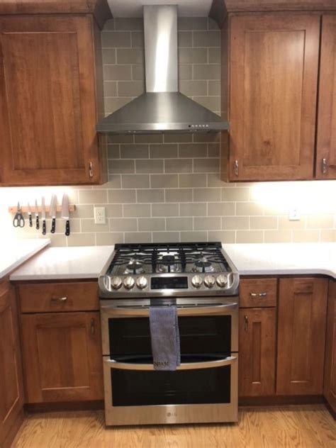 While it may seem that these are the culprit for making your kitchen look like it's stuck in the past, there are a lot of other elements that can be changed to make your cabinets look like they belong in this time period. Replaced golden oak with stained Maple cabinets from Crystal Cabinets and Cambria Quartz tops ...