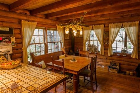 Low prices per night, book now! One Story Log House With Wrap Around Porch
