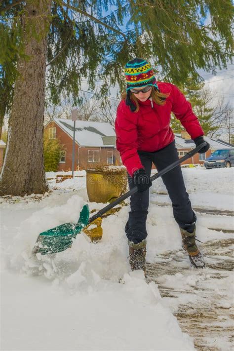 132 Woman Shoveling Snow Driveway Stock Photos Free And Royalty Free