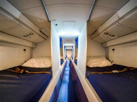 See The Secret Bedrooms Where Flight Attendants Sleep On Long Flights