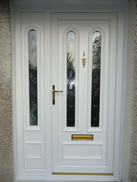 A Lovely White Pvc Panel Front Door With Side Screen To Compliment