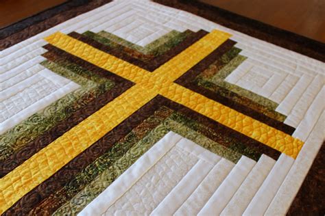 Many quilters love log cabin quilt pattern layouts because of the design's history and the the log cabin quilt pattern was borrowed from ancient egyptian and roman materials and tile work and has thrived throughout the centuries. Cross Quilt pattern Log Cabin Christian Cross Twin size: