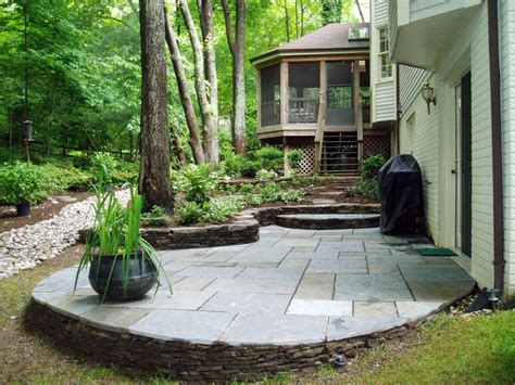 In An Effort To Maintain The Intimacy Of This Wooded Backyard A Space