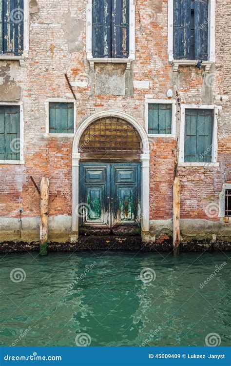 Buildings With Traditional Venetian Windows In Venice Italy Stock