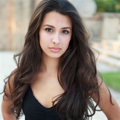 We've got several pieces of advice on if talking about thick wavy hair options, let's start with a classic crop top with a high fade dropping. long-layered-hairstyles-loose-waves - Hairstyle Stars