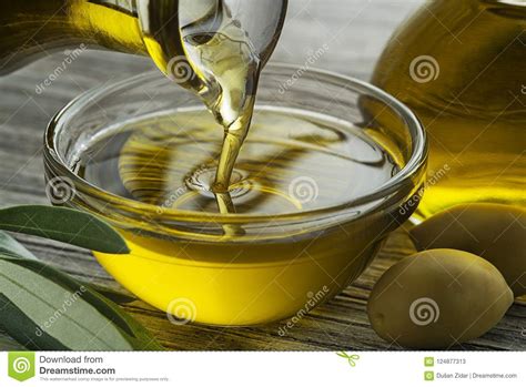 Bottle Of Olive Oil Pouring In Glass Stock Image Image Of Food Fats